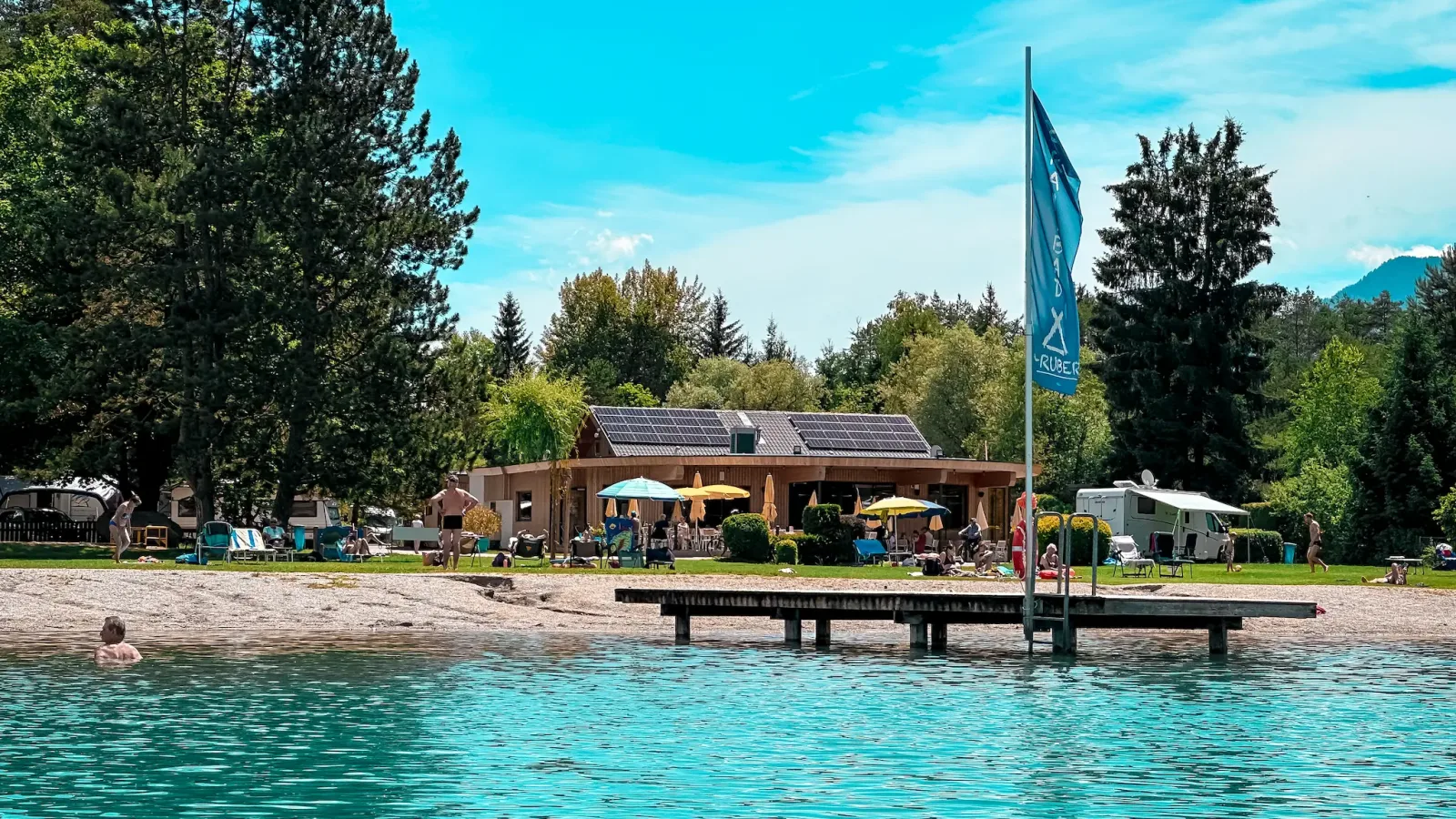 Strandcamping Gruber direkt am türkisen Faaker See mit Steg und Badewiese